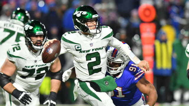 New York Jets QB Zach Wilson throws under pressure against Buffalo Bills